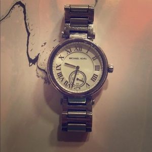 Silver women’s Michael Kors watch